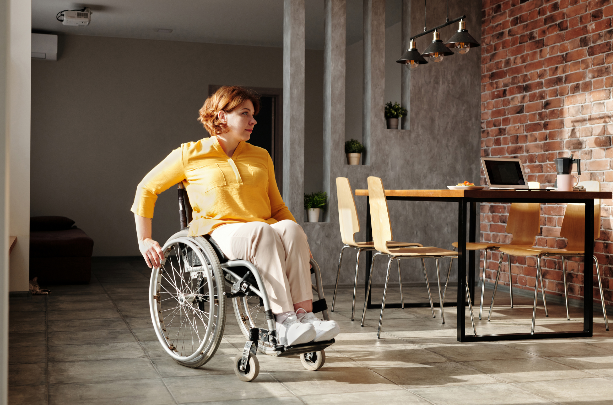 Woman with wheelchair in an office